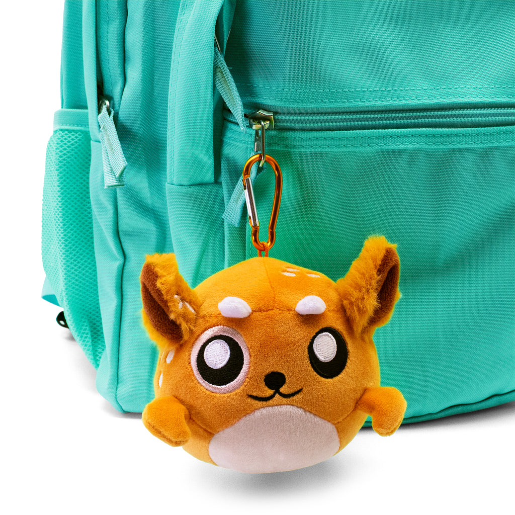 doomlings fawn mini plushie plush shy deer clipped to a backpack