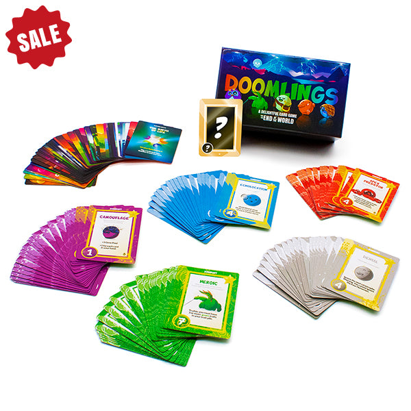 doomlings classic game with cards splayed around it