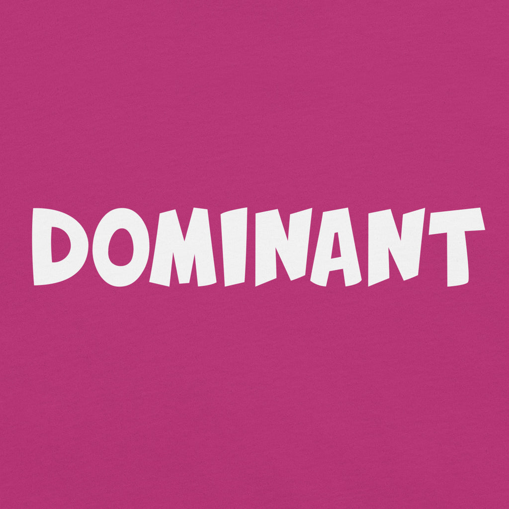 closeup of pink tshirt with the words dominant written on it in the doomlings font