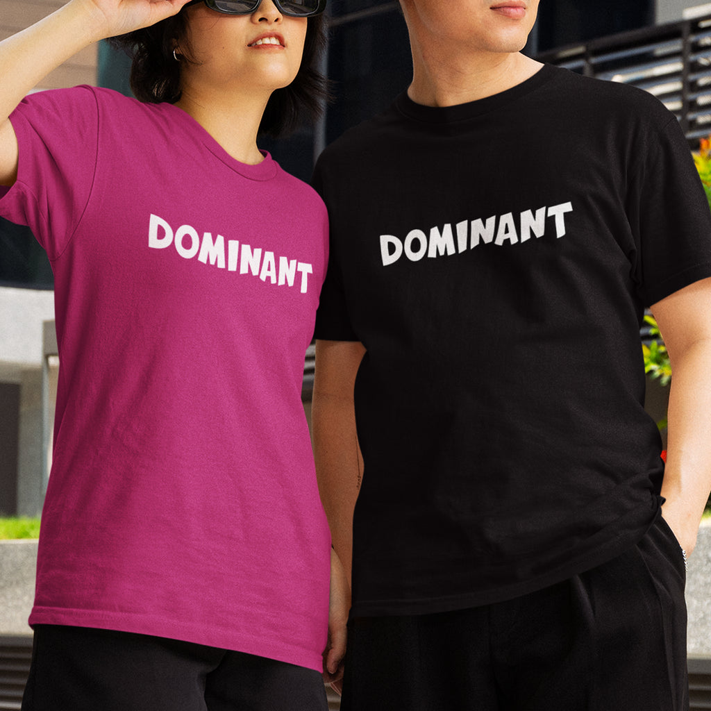 woman and man wearing tshirts with the words dominant written on it in the doomlings font