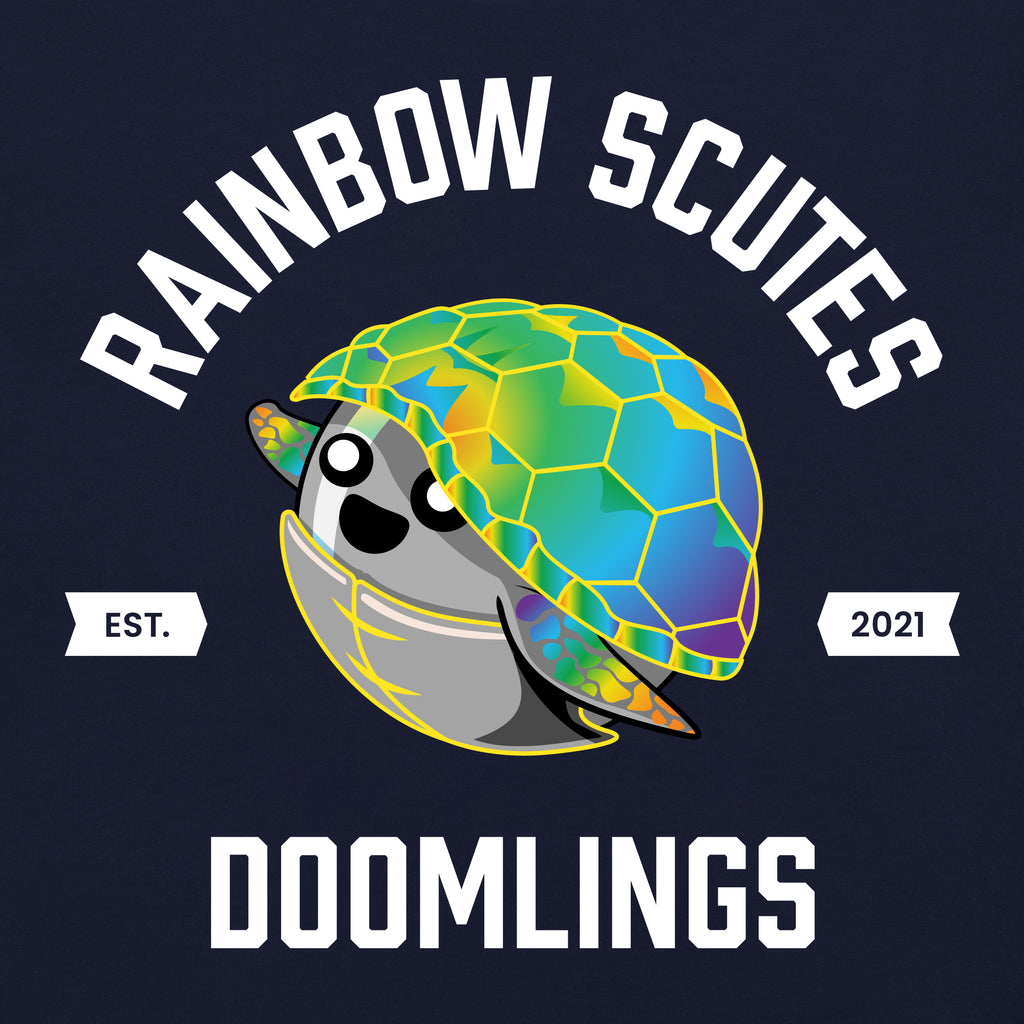 closeup of rainbow scutes college tee, navy t-shirt, text says 'rainbow scutes doomlings est. 2021'