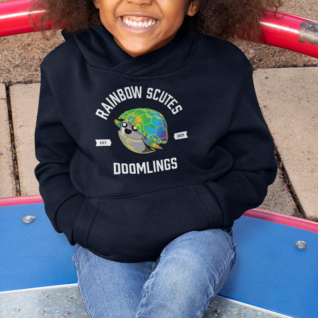 kid wearing navy rainbow scutes hoodie