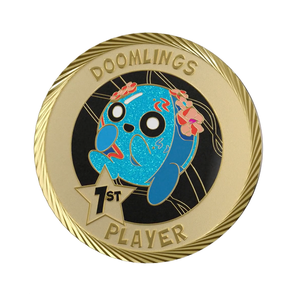 contagious doomlings first player medallion coin, gold coin that says doomlings 1st player with cute art on it.